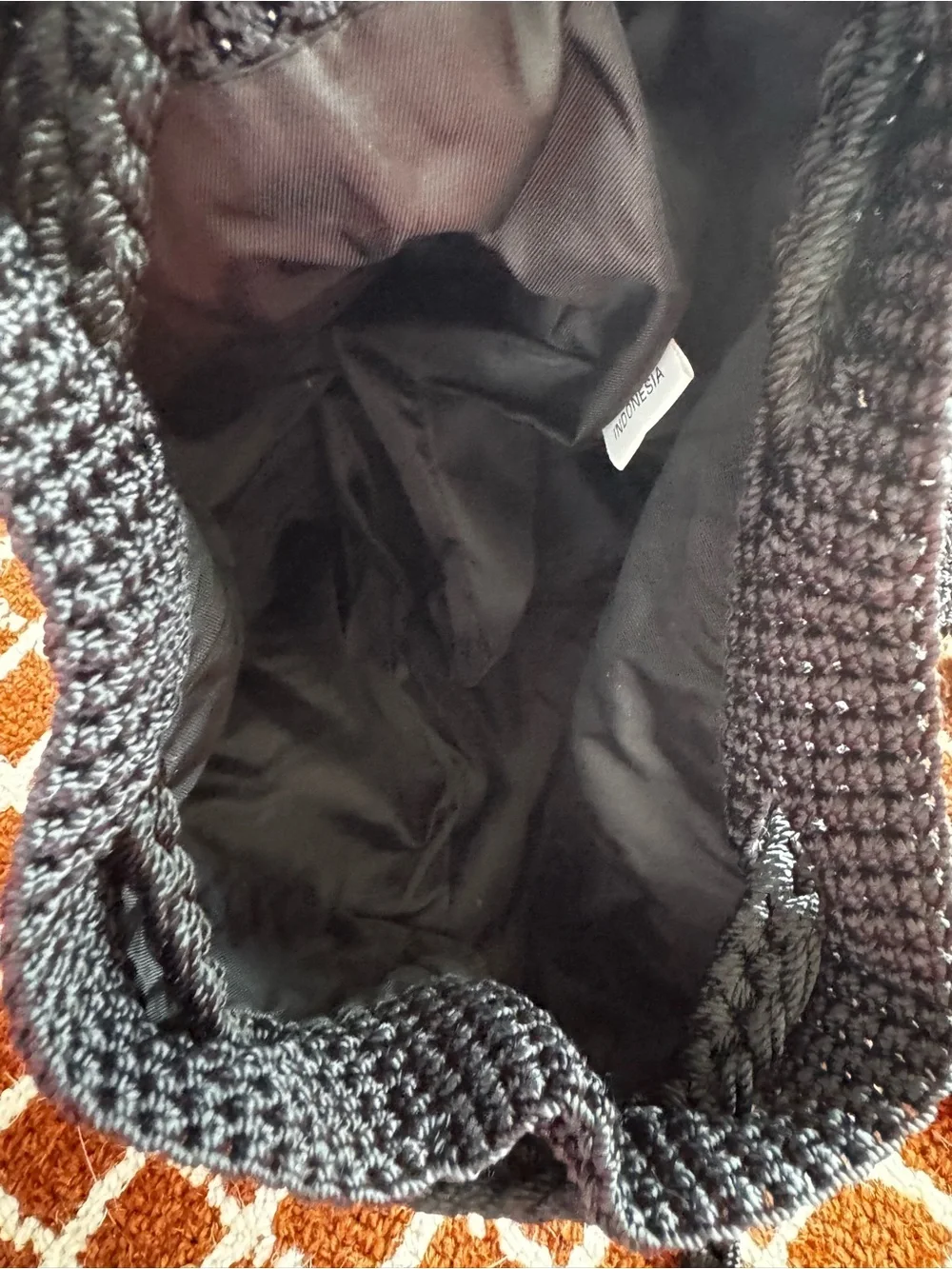 The Sak Black Crochet Drawstring Backpack